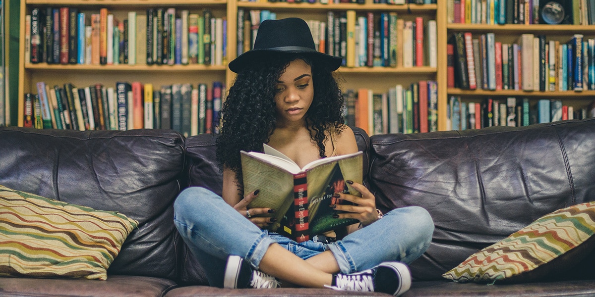 Woman building self esteem through reading