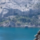 Man balancing atop a towering pillar of rocks, symbolizing the precarious nature and challenges of managing Antisocial Personality Disorder.