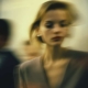 A woman in a blurry social setting with subtly distorted features, visually representing Body Dysmorphia Symptoms and the feeling of disconnection in social environments.