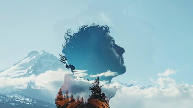 a man looking upward in contemplation, superimposed onto a serene mountain landscape. symbolizing hope and clarity in discussions about who diagnoses mental illness.