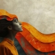 Illustrative image of woman with orange and red waves moving from her head showing healing from negative self-thoughts